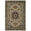 Oriental Weavers Andorra 2442 Green D rug showcasing intricate patterns with green and beige tones in a traditional setting.