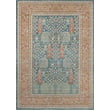 Momeni Isabella ISA-8 Blue rug showcasing intricate patterns in blue and beige tones, perfect for adding elegance to any room.