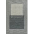 Momeni Archer ARC-5 Blue rug, featuring a blend of blue and ivory hues; hand-tufted construction adds texture in a modern setting.