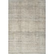 Modern room featuring Nourison Nyle NYE-06 rug in ivory, beige, and grey tones, enhancing the elegant interior decor ambiance.