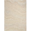 Nourison Graceful GRU-01 Beige rug, hand-tufted, featuring a soft beige tone with elegant patterns, in a cozy living space setting.