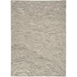 Nourison Graceful GRU-01 Grey rug, hand-tufted design showcasing subtle grey hues in a living room setting with wooden flooring.