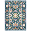 Safavieh Aspen APN-129 Blue, Green Hand-Tufted rug featuring intricate patterns in a cozy room setting with wooden floors.