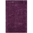 Plush and vibrant Safavieh Indie Shag SGI-320 Purple rug, featuring a rich purple hue, crafted from polyester for a cozy, contemporary setting.