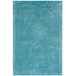 Turquoise Safavieh Indie Shag rug, SGI-320, made of polyester, displayed in a modern setting, featuring a plush, cozy texture.