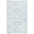 Safavieh Ebony EBN-655 rug in ivory and light blue on a hardwood floor, showcasing its elegant hand-tufted design and soft tones.