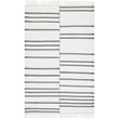 Surya Azalea 18657 Ivory, Black (AZA-2333) rug, handwoven, showcasing intricate patterns in a neutral, elegant living room setting.