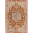 Livabliss Mona Lisa 32322 rug in brick, tan, and blue colors on hardwood floor, enhancing a cozy living room setting.