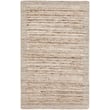 Surya Yasmin 31118 rug in brown, beige, and black with hand-knotted design, displayed on a hardwood floor setting.