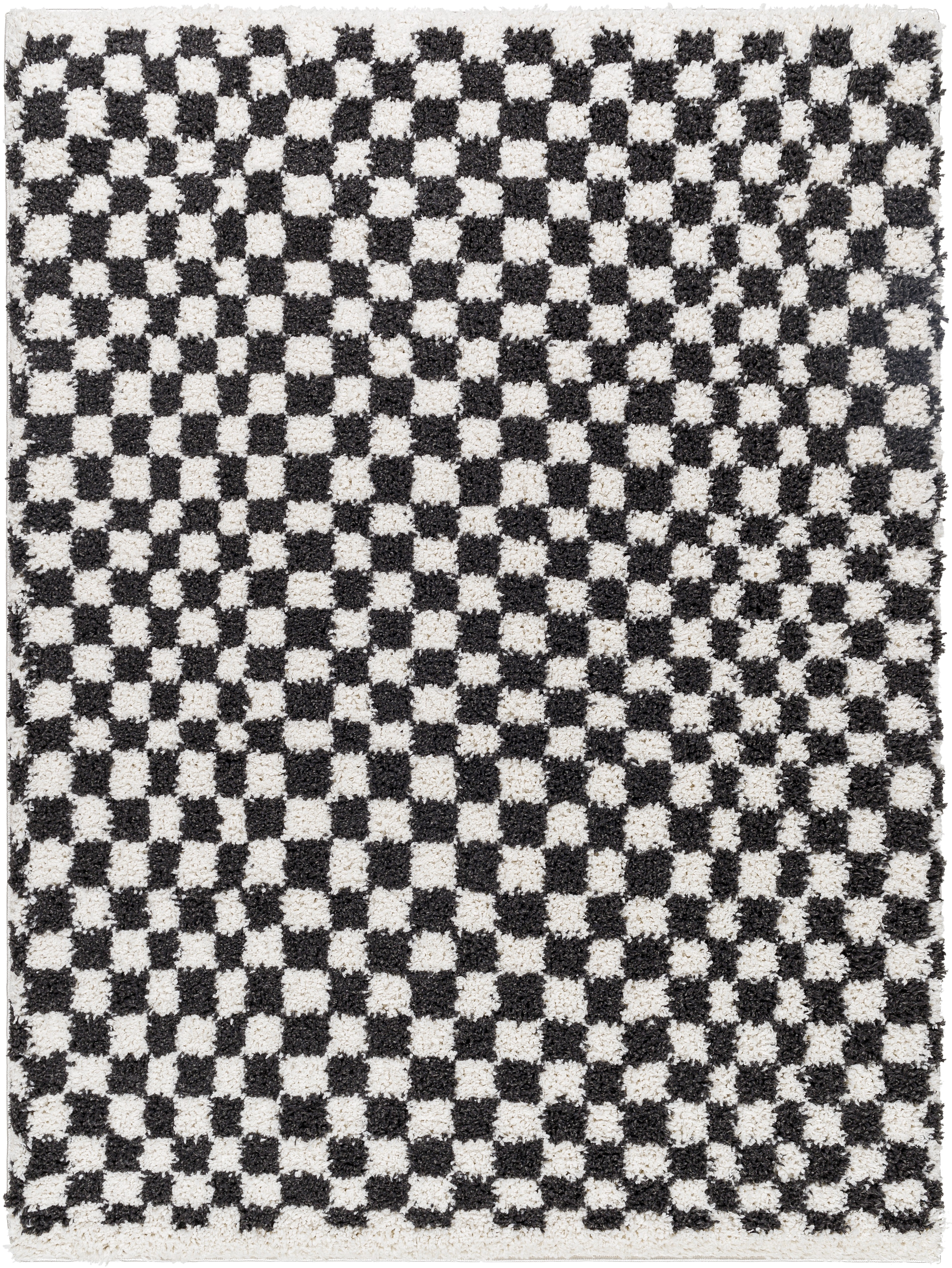 Livabliss Birmingham 476576 Ivory, Black rug in a modern setting, showcasing its intricate pattern and chic color contrast.