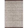 Surya Jadie 489335 handwoven rug in grey, pewter, and ash hues in a living room setting, showcasing intricate woven details.