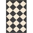Vivir x Livabliss Antho 541341 rug in jet black, beige, and pearl colors, handwoven jute, displayed in a stylish modern setting.