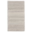 Capel Vivid Vivid White, Grey, Charcoal braided rug showcasing a blend of neutral tones on a hardwood floor setting for modern decor.