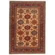 Capel Kindred Medallion rug in tan, blue, and red showcasing an intricate pattern, perfect for adding elegance to any room.