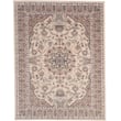 Capel Thrace Heriz Cream rug in a wool blend with a traditional ornate pattern featuring cream, red, and blue hues in a room setting.