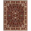 Capel Urda Isfahan Rust rug in warm earth tones with intricate patterns displayed in a cozy living room, hand-tufted for elegance.