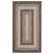 Capel Winthrop Winthrop Brown Tan braided rug featuring earthy tones of brown and tan, ideal for rustic or cozy home settings.