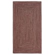 Capel Worcester Braided Red rug with rich hues of red and earth tones, showcasing its durable braided construction .