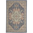 Capel Sanibel Tabriz rug in navy, green, and tan. Features an intricate design, Olefin material, perfect for a stylish living area.