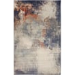 Liora Manne Ariana Mystic Dusk rug in serene blue and ivory hues, showcasing an intricate design. Perfect for elegant living spaces.