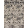 Karastan Vanguard Caliente Dim Grey rug in silvery grey hues, showcasing intricate patterns. Perfect for modern, elegant home decor.