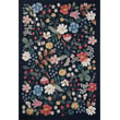Rifle Paper Co. x Loloi Perennial Strawberry Fields PRN-02 rug in navy and black with floral design on hardwood flooring.