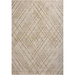 Loloi II Rugs Wade WAE-04 Beige Gold showcases a blend of beige and gold hues in a cozy living space, enhancing modern home decor.