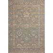 Chris Loves Julia x Loloi Louisa LOI-04 Lagoon Ivory rug in shades of blue and white, featuring a plush texture, enhancing a modern home setting.