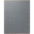 Handwoven Loloi Rugs Duncan DUN-01 Sky rug in shades of blue and ivory, featuring a modern design, placed in a minimalist setting.