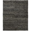 Feizy Rugs Berkeley 6790821F Grey handwoven rug in a modern living room setting, showcasing a subtle grey pattern on the floor.