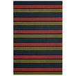 Chilewich Shag Ribbon Stripe Limelight rug in a vibrant striped design, ideal for modern spaces, shown in a brightly lit room.