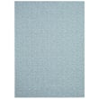 Chilewich Woven Pepper Mint (002) rug, featuring a textured mint green and white pattern, showcased on a light wood floor setting.