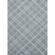 Chilewich for Martha Stewart Woven Ribbons Sea rug in a serene blue and white pattern, adding elegance to any modern space.