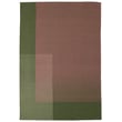 nanimarquina Haze Pink, Green rug displayed on a light wooden floor, showcasing its elegant hand-loomed texture and subtle pastel hues.