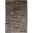 Nanimarquina Colorado Ashes rug, hand-knotted, features subtle shades of gray and beige in a modern, minimalist design perfect for a serene living space.