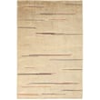 Nanimarquina Colorado Sand rug, hand-knotted with a blend of earthy tones, displayed in a modern interior setting.