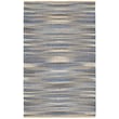 Rajani Home Nathalia rug in denim blue, light blue, and tan, handwoven design showcasing intricate patterns on a flat surface.