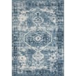 Rajani Home Eastbourn Remi Blue, Ivory rug showcases an intricate pattern with a blend of blue and ivory tones in a stylish, modern design.
