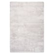 Gray Toulemonde Bochart Delice Silver rug, featuring a hand-tufted construction, displayed in a modern room setting.