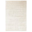 Toulemonde Bochart Glam Glam Ivory rug, handwoven, displaying a soft ivory hue in a cozy interior setting, adding elegance and warmth.