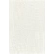 Toulemonde Bochart Kantha Kantha White rug, hand-tufted with intricate white and beige patterns, enhancing a modern interior setting.