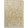 Laura Ashley Newborough Pale Gold rug featuring a soft chenille texture with a gold hue, elegantly displayed in a modern living room setting.