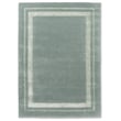 Laura Ashley for Brink and Campman Redbrook Duck Egg rug, hand-tufted; soft hues in a cozy room setting, enhancing decor elegance.