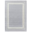 Laura Ashley for Brink and Campman Redbrook Silver rug, hand-tufted, displaying elegant silver tones on a living room floor setting.