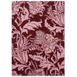 Ted Baker Brink and Campman Baroque Pink rug, hand-tufted design with intricate patterns and vibrant pink tones, displayed in a modern setting.