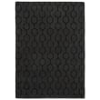 Wedgwood for Brink and Campman Gio Noir rug, hand-tufted in black with abstract patterns, enhancing a modern living room setting.