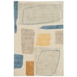 Scion for Brink and Campman Composition Papaya rug in vibrant orange and cream tones, hand-loomed for a modern living room setting.