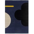 Orla Kiely Geo Flower rug in denim blue, hand-tufted with floral geometric design, perfect for modern and stylish interiors.