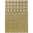 Ted Baker Houndstooth II mustard rug, hand-tufted with a bold houndstooth pattern, displayed in a modern room setting.