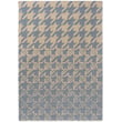 Ted Baker Houndstooth II rug in washed blue, hand-tufted design, showcasing a classic houndstooth pattern for an elegant setting.